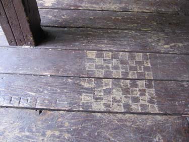 checkerboard carved on shelter floor